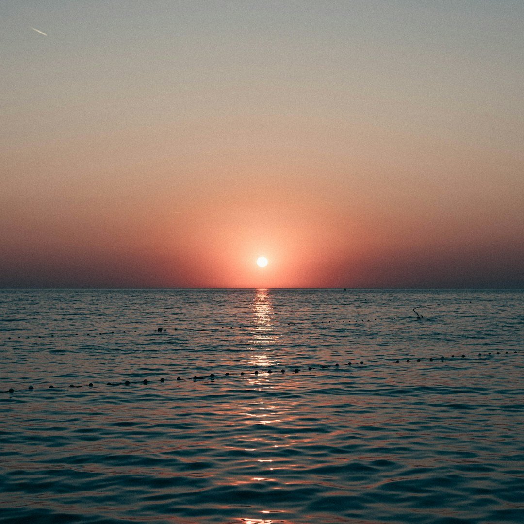 Minimalist horizon line at sunset over the open sea near Vis island